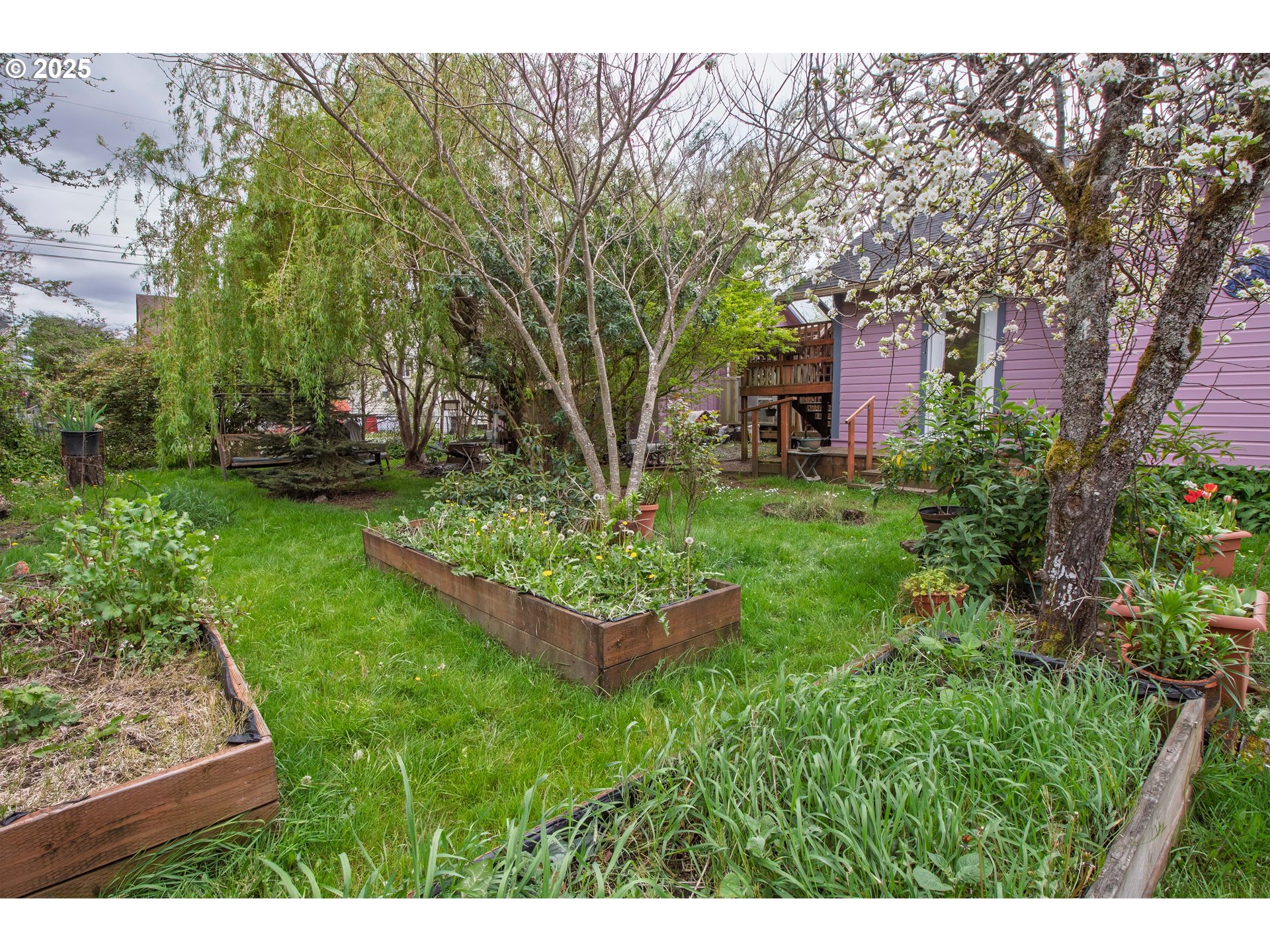 655 6th Street Myrtle Point, OR 97458 - Photo 22 of 31 a garden view with a seating space