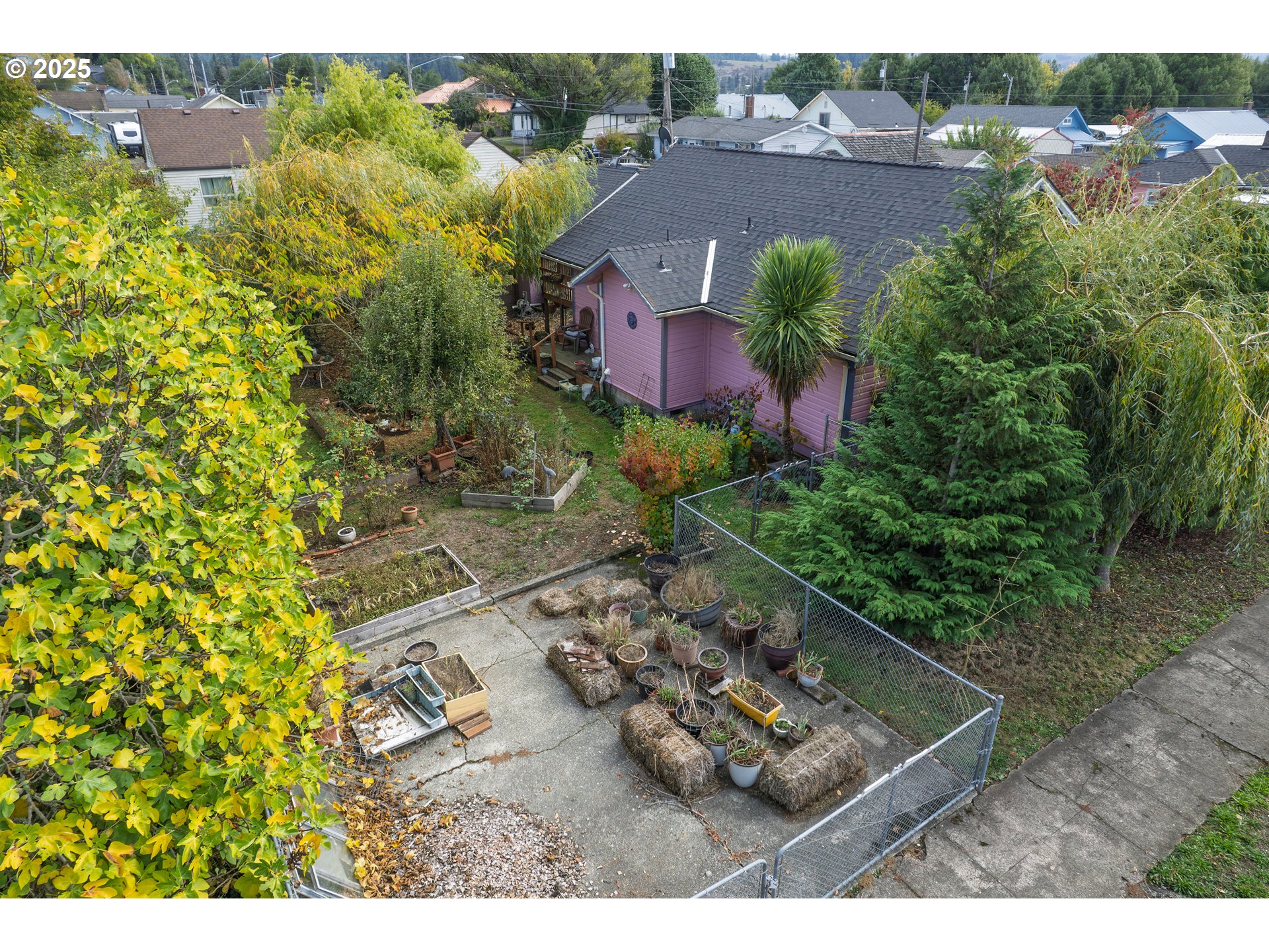 655 6th Street Myrtle Point, OR 97458 - Photo 24 of 31 an aerial view of a house with a yard basket ball court and outdoor seating