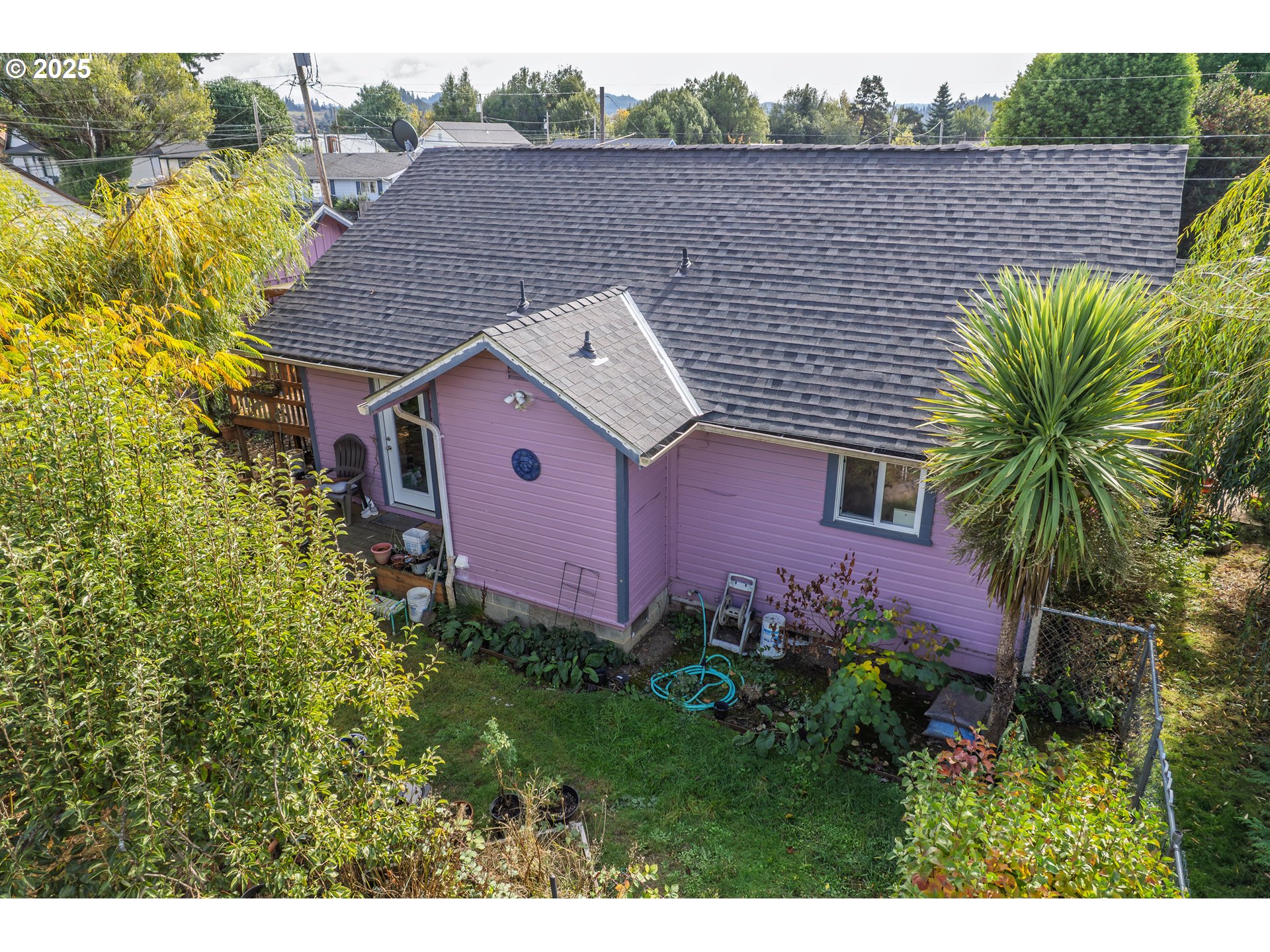 655 6th Street Myrtle Point, OR 97458 - Photo 25 of 31 a aerial view of a house with a yard and plants