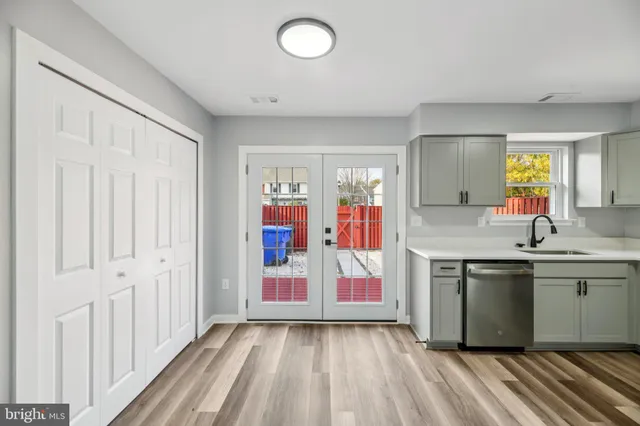 a view of utility room and kitchen sink