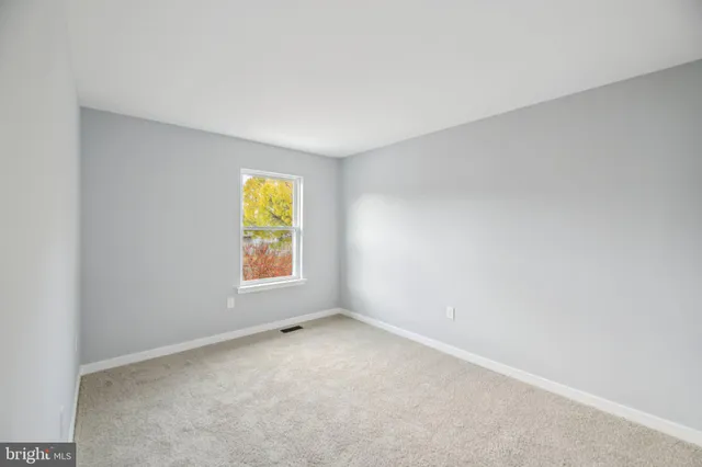 a view of an empty room with window