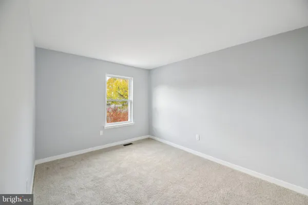 a view of an empty room with window