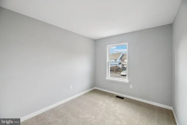 an empty room with window