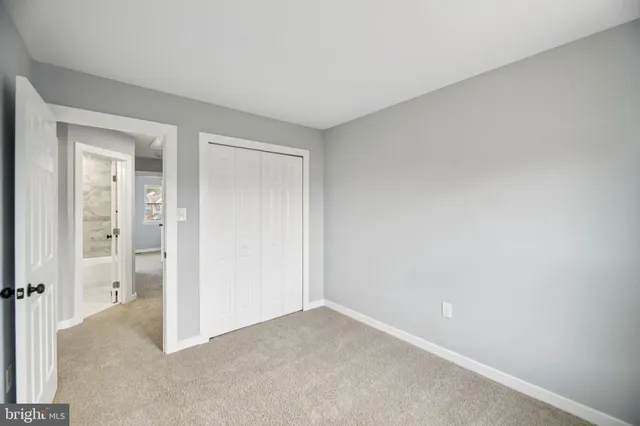 an empty room with closet