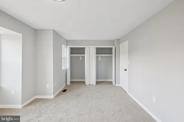 an empty room with closet