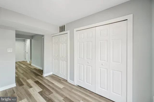 a view of a livingroom with wooden floor