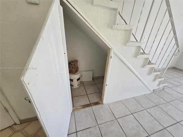 a view of balcony with furniture