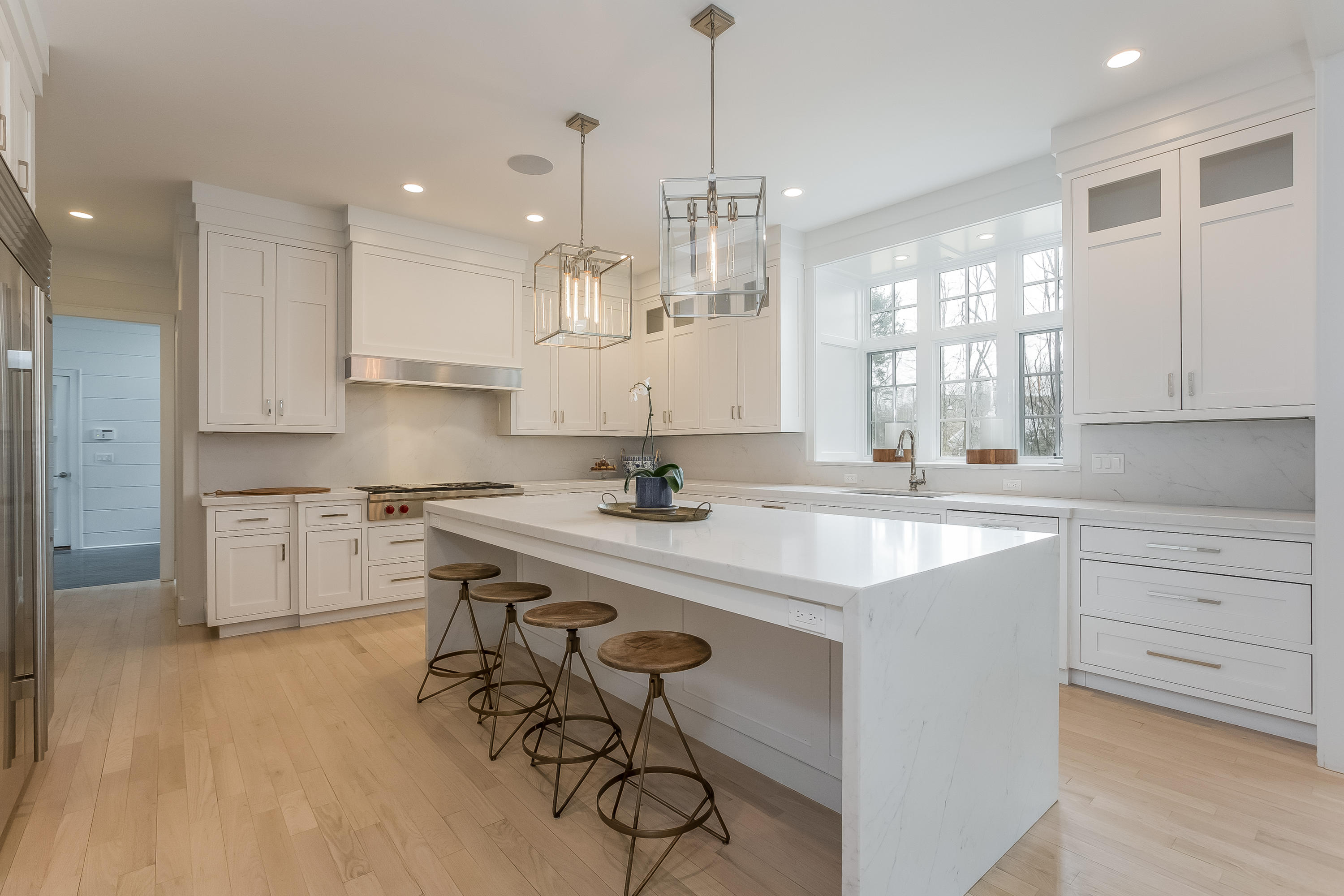 676 Hollow Tree Ridge Road Darien, CT 06820 - Photo 11 of 50 a kitchen with a sink stove and cabinets