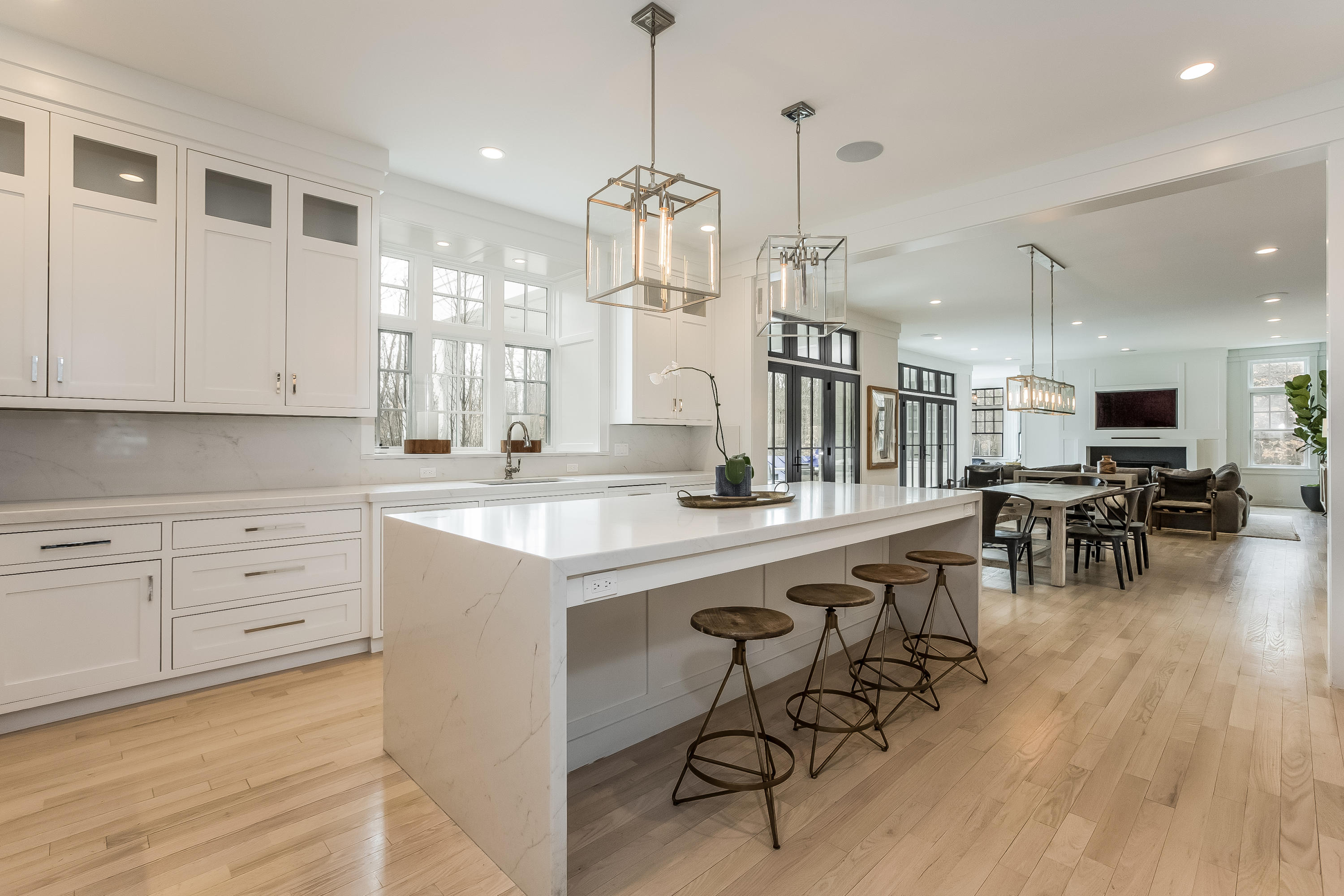 676 Hollow Tree Ridge Road Darien, CT 06820 - Photo 13 of 50 a large kitchen with a table and chairs in it