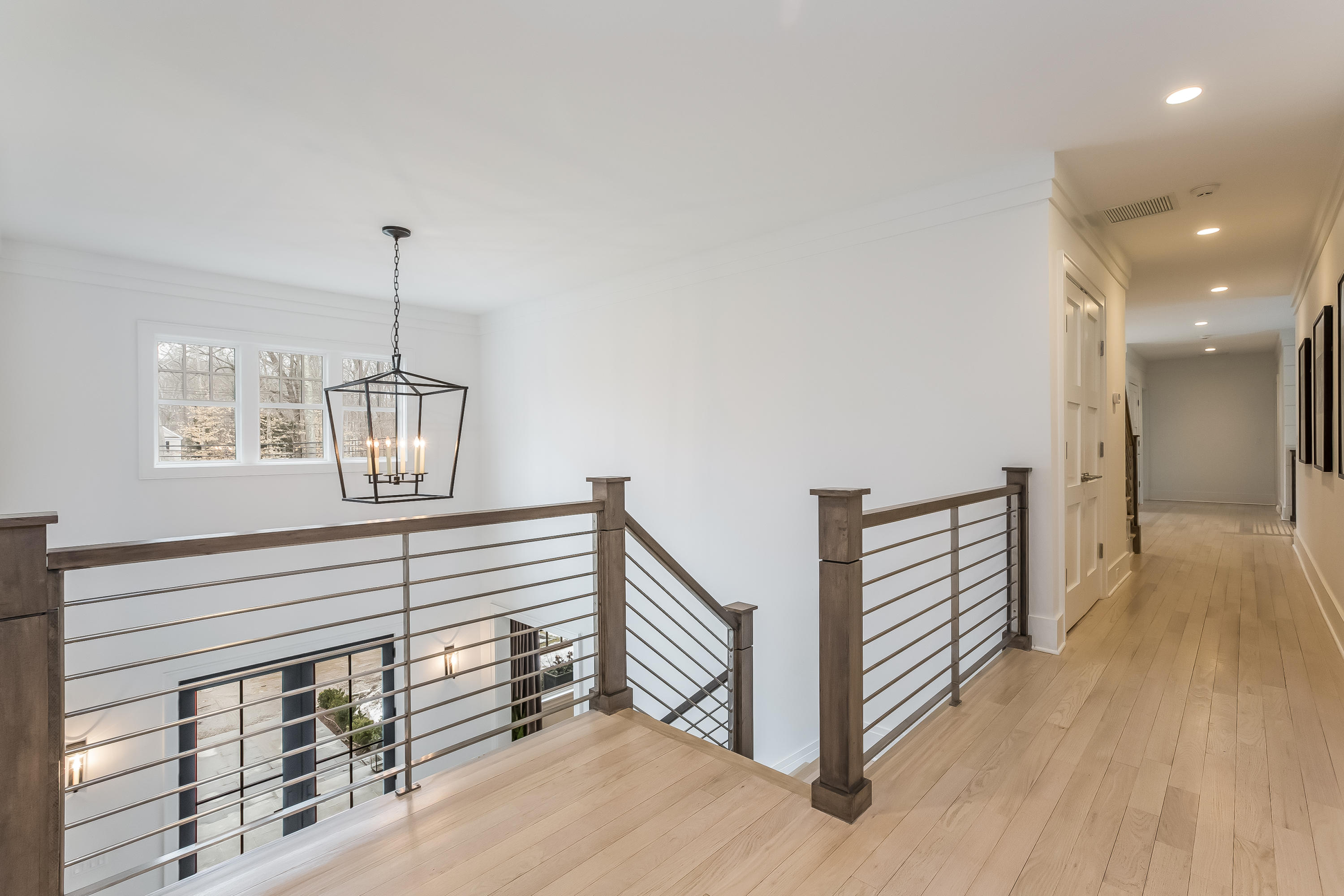676 Hollow Tree Ridge Road Darien, CT 06820 - Photo 21 of 50 a view of entryway and hall with wooden floor
