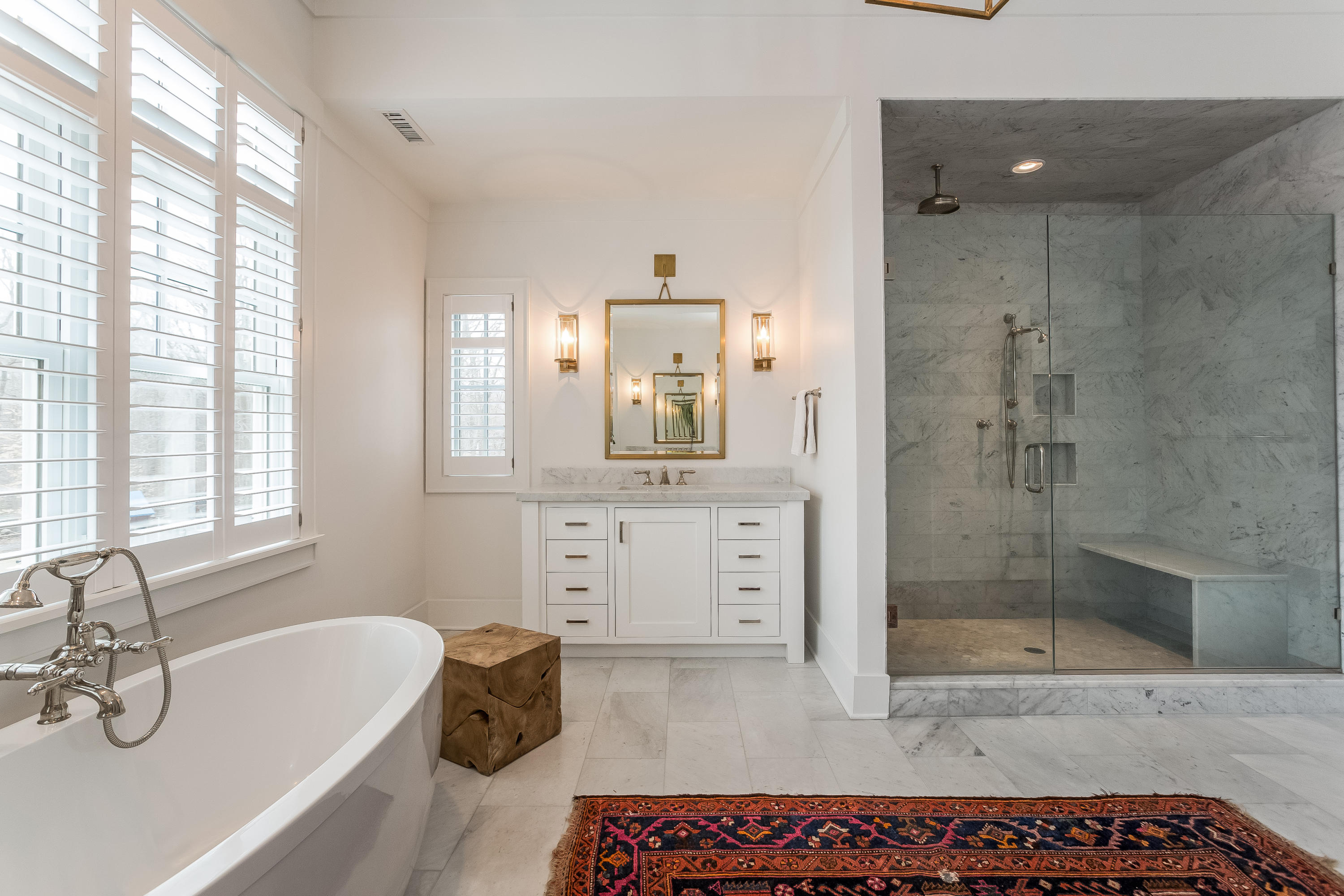 676 Hollow Tree Ridge Road Darien, CT 06820 - Photo 27 of 50 a spacious bathroom with a tub sink and shower