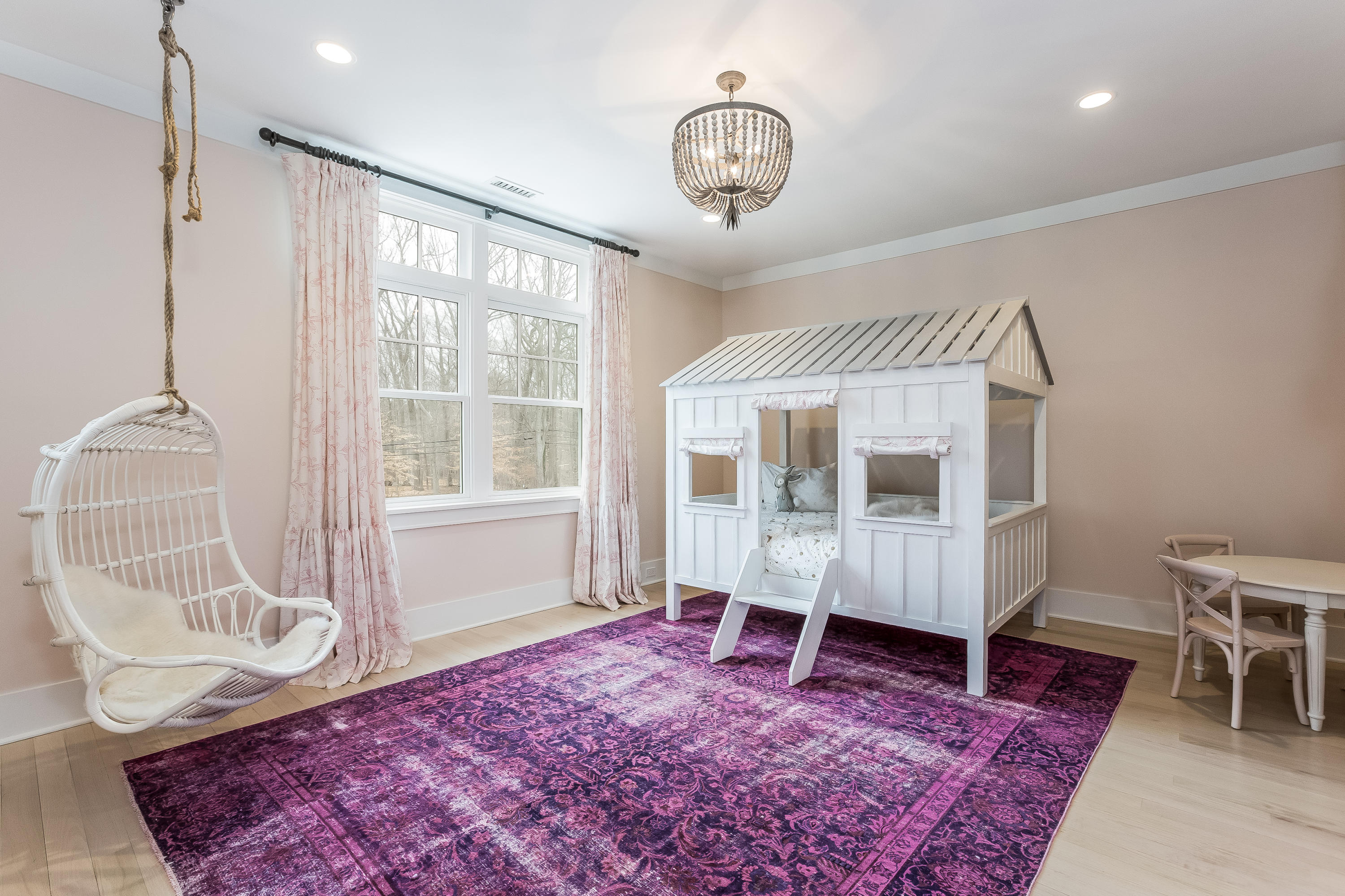 676 Hollow Tree Ridge Road Darien, CT 06820 - Photo 30 of 50 a spacious bedroom with a bed and wooden floor
