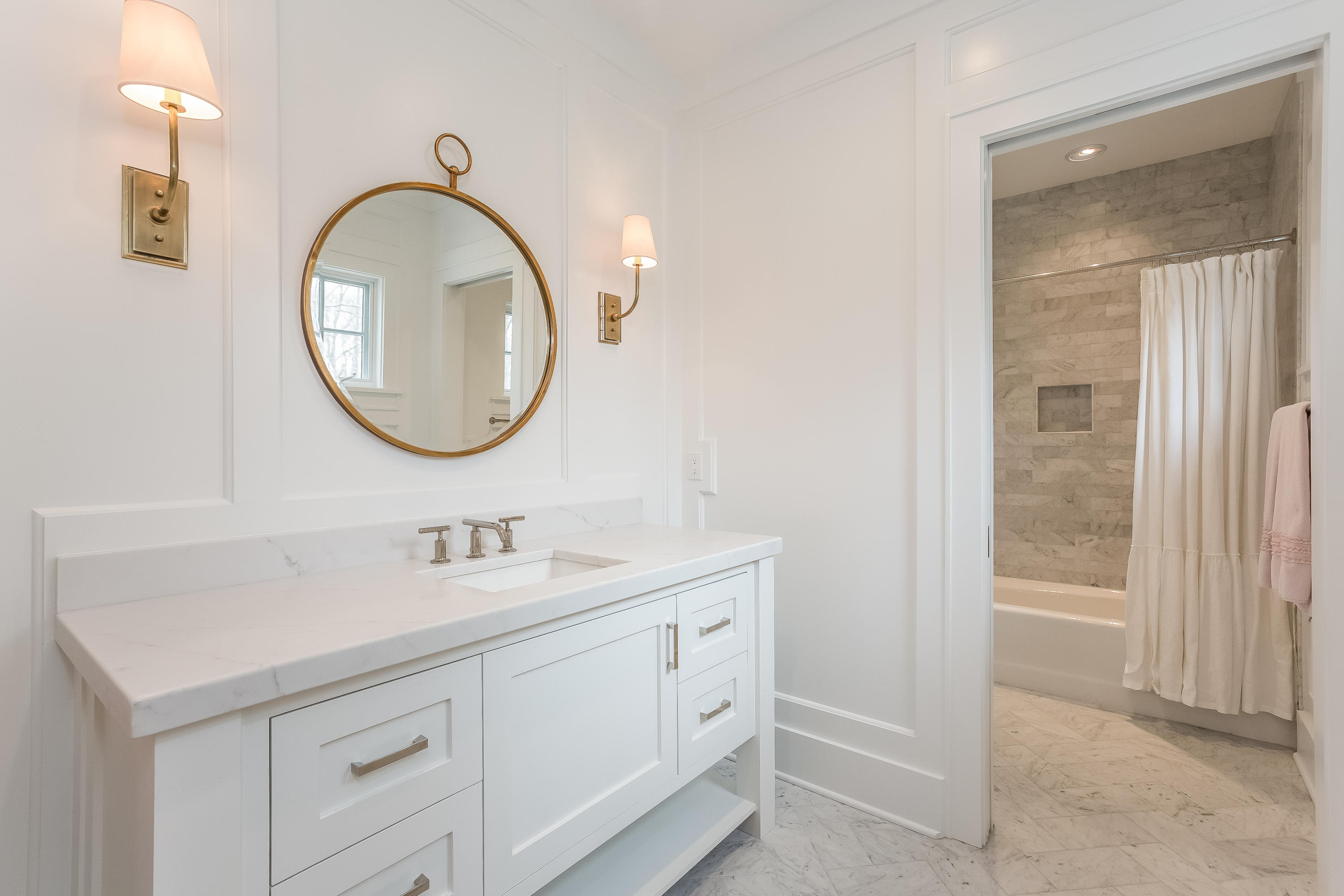 676 Hollow Tree Ridge Road Darien, CT 06820 - Photo 31 of 50 a bathroom with a sink and a mirror