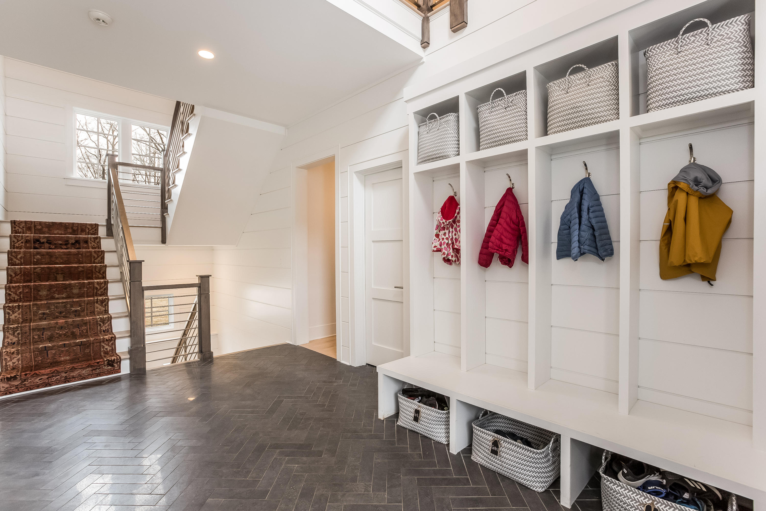 676 Hollow Tree Ridge Road Darien, CT 06820 - Photo 36 of 50 a view of walk in closet with clothes and shoes