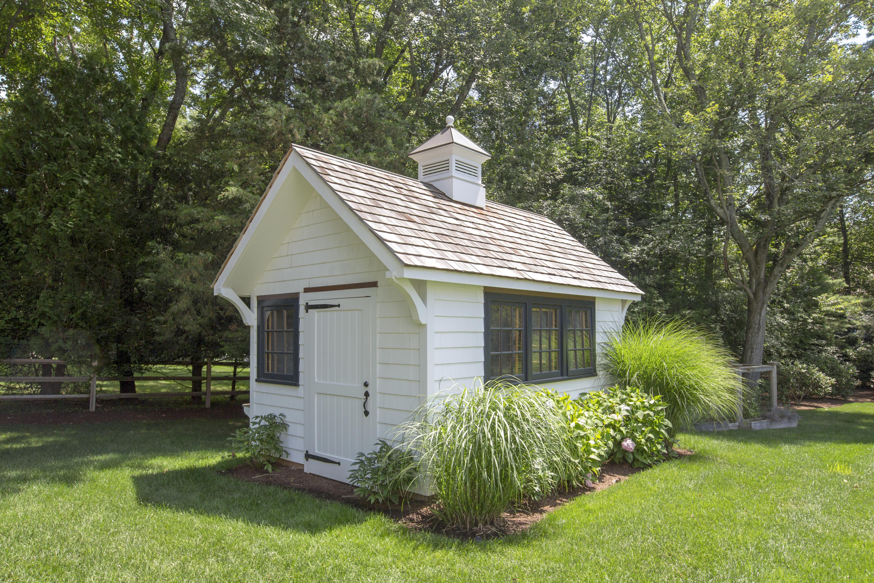 676 Hollow Tree Ridge Road Darien, CT 06820 - Photo 42 of 50 a front view of house with a garden