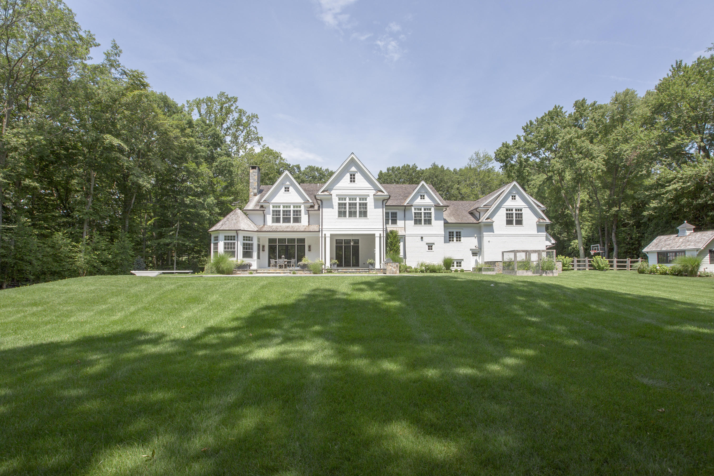 676 Hollow Tree Ridge Road Darien, CT 06820 - Photo 45 of 50 a view of house with yard and green space
