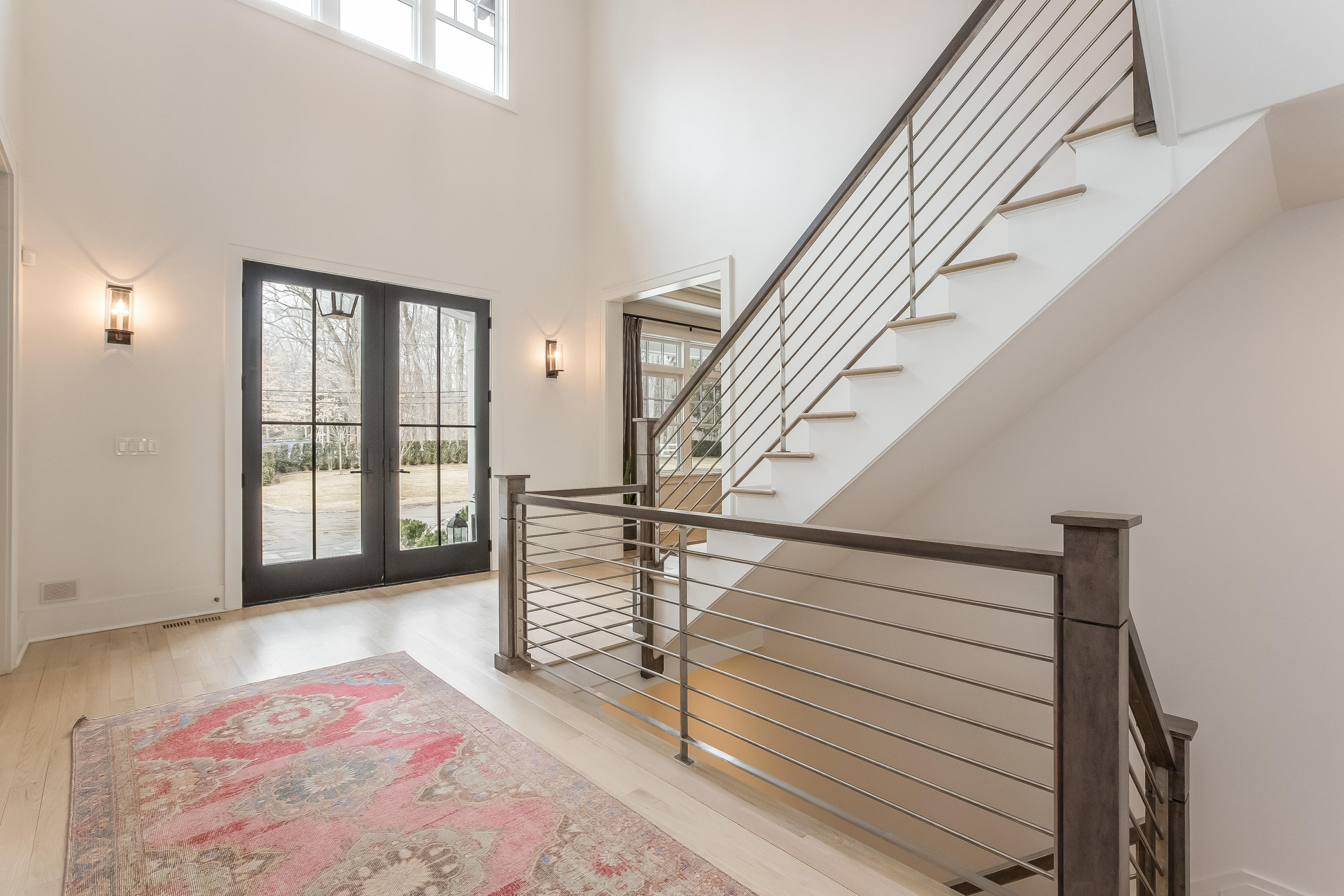 676 Hollow Tree Ridge Road Darien, CT 06820 - Photo 5 of 50 a view of an entryway with staircase