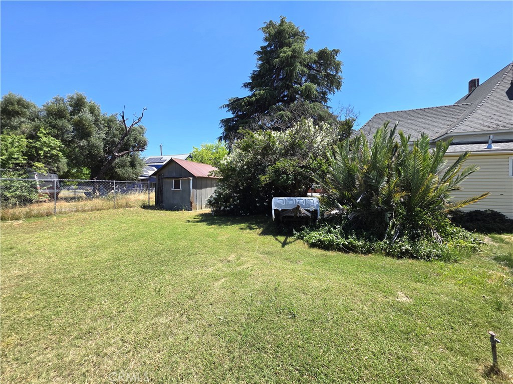 1414 Marin Street Corning, CA 96021 - Photo 34 of 43 a backyard of a house with table and chairs
