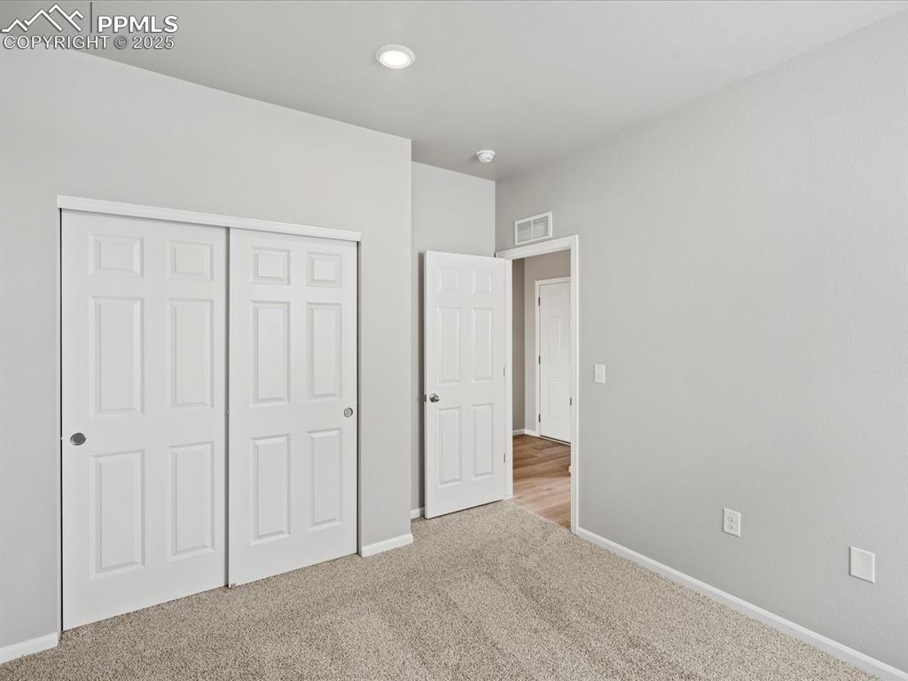 10434 Devoncove Drive Peyton, CO 80831 - Photo 13 of 24 a view of an empty room