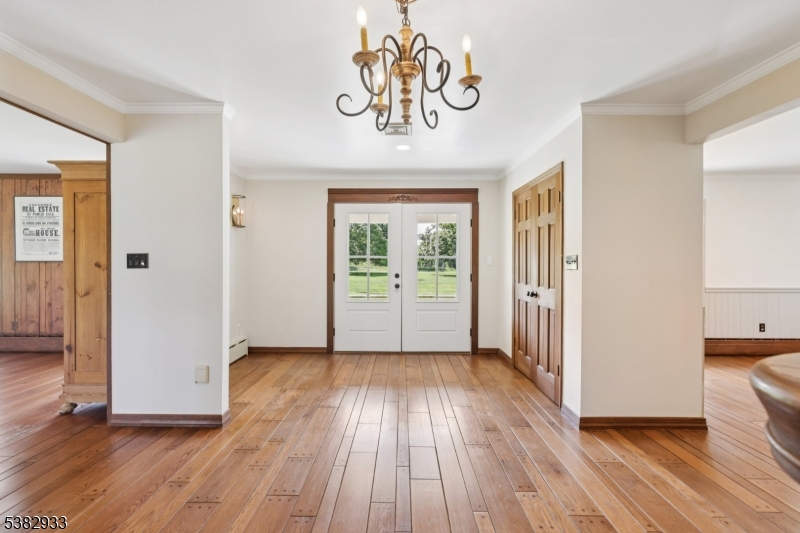60 Perryville Road Pittstown, NJ 08867 - Photo 14 of 50 a view of hallway with wooden floor and window