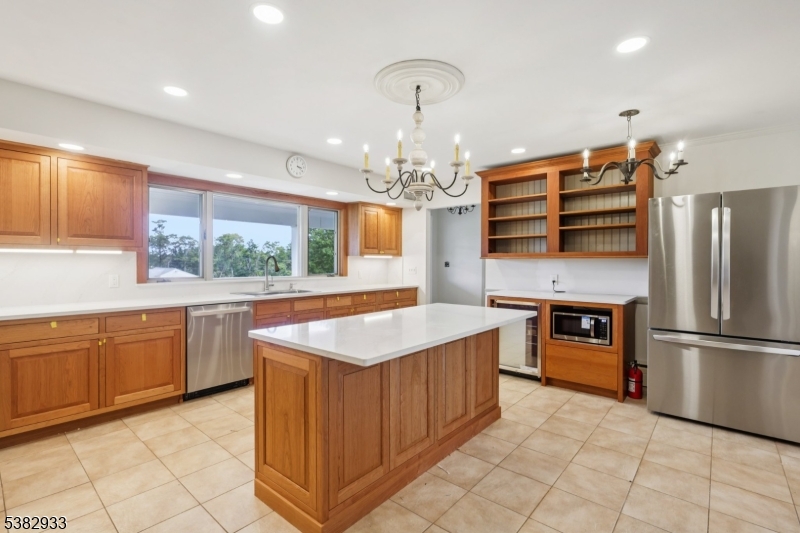 60 Perryville Road Pittstown, NJ 08867 - Photo 19 of 50 a kitchen with stainless steel appliances granite countertop a sink and a refrigerator