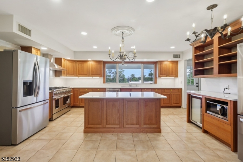 60 Perryville Road Pittstown, NJ 08867 - Photo 20 of 50 a kitchen with stainless steel appliances granite countertop a stove and a refrigerator