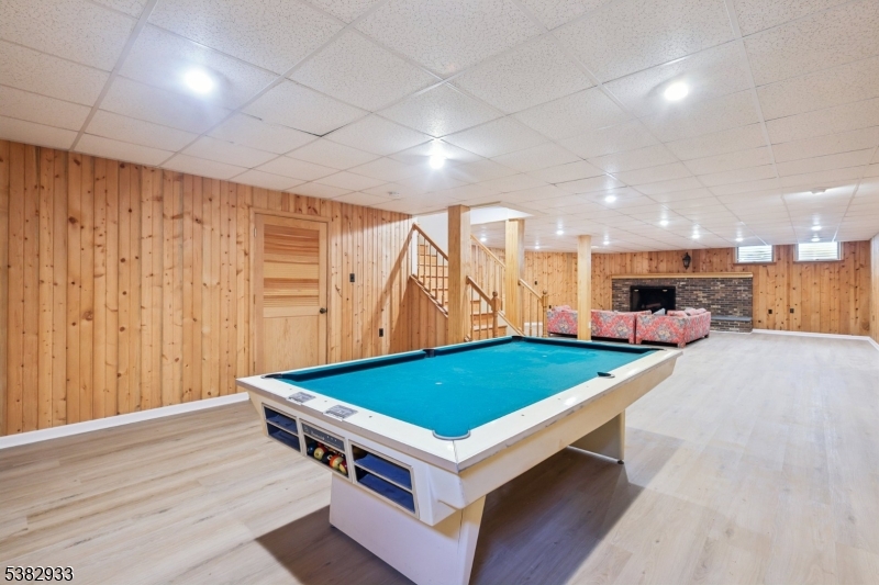 60 Perryville Road Pittstown, NJ 08867 - Photo 35 of 50 a room with pool table and wooden floor