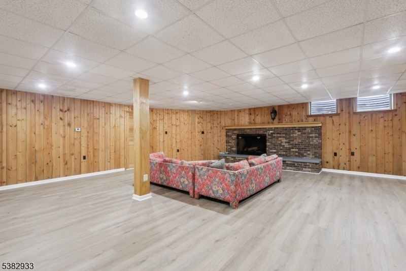 60 Perryville Road Pittstown, NJ 08867 - Photo 36 of 50 a living room with furniture and a fireplace