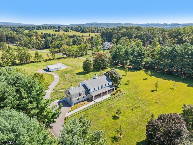 60 Perryville Road Pittstown, NJ 08867 - Photo 41 of 50 an aerial view of a residential houses with swimming pool and outdoor space
