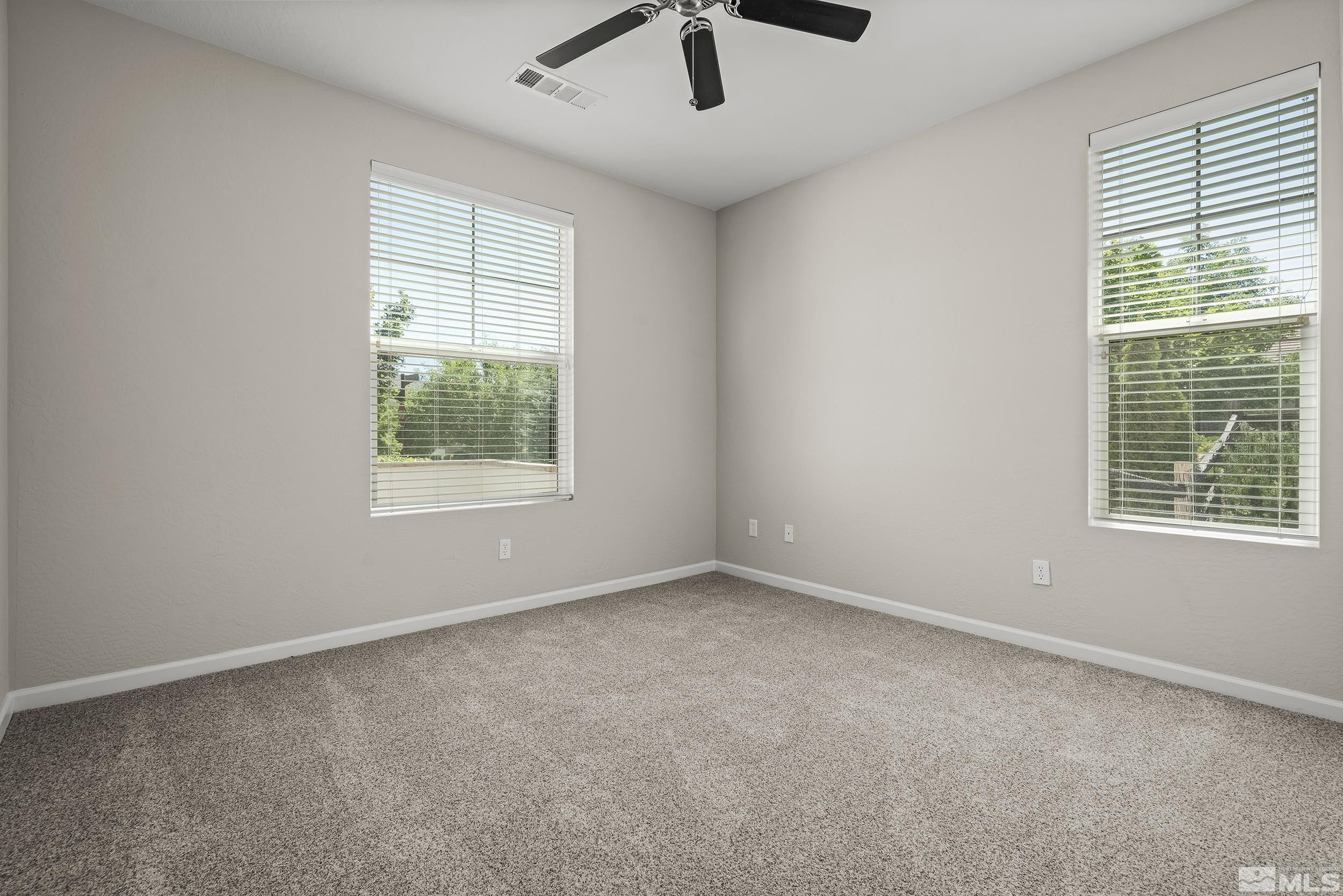 9195 Heritage Ridge Court Reno, NV 89523 - Photo 14 of 30 an empty room with a window