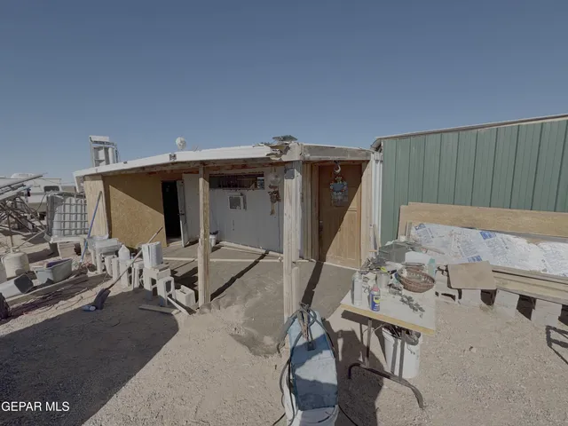 a bed room with a bed and a couch