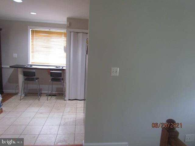9002 Lesan Road Randallstown, MD 21133 - Photo 5 of 16 Breakfast bar to the left of the kitchen