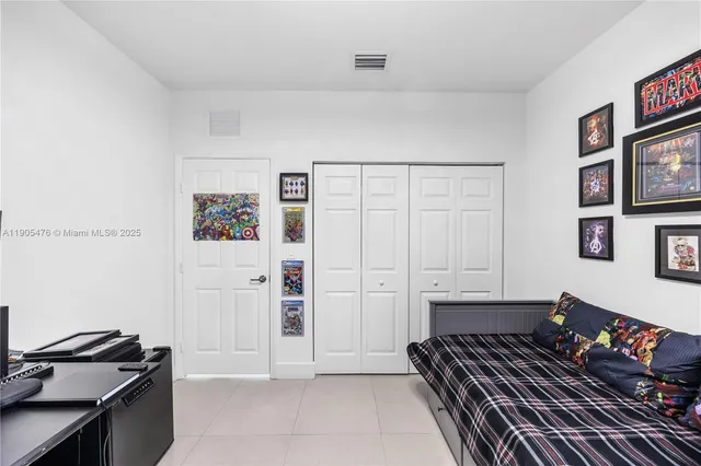 a bathroom with a sink mirror toilet and shower