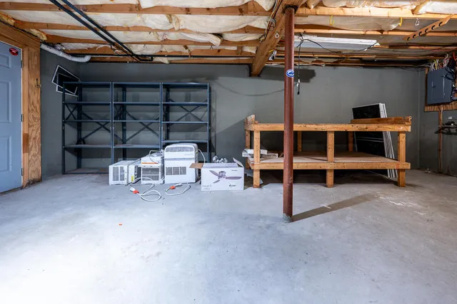 a view of a chairs and table in a room