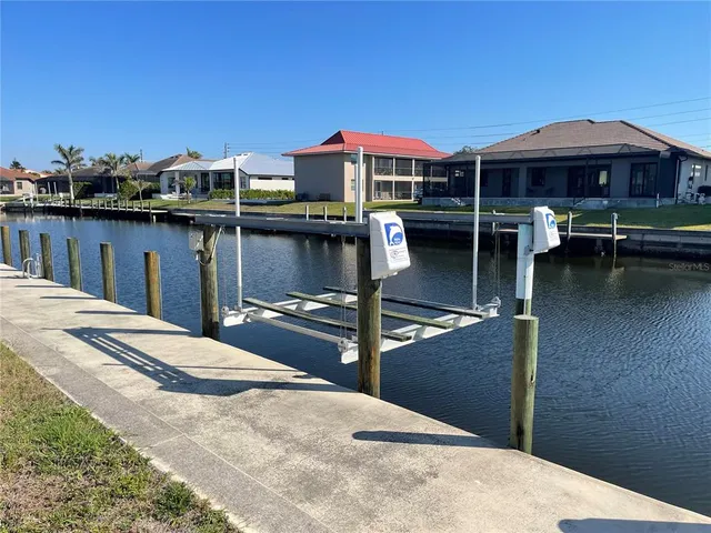 a view of a balcony with chairs