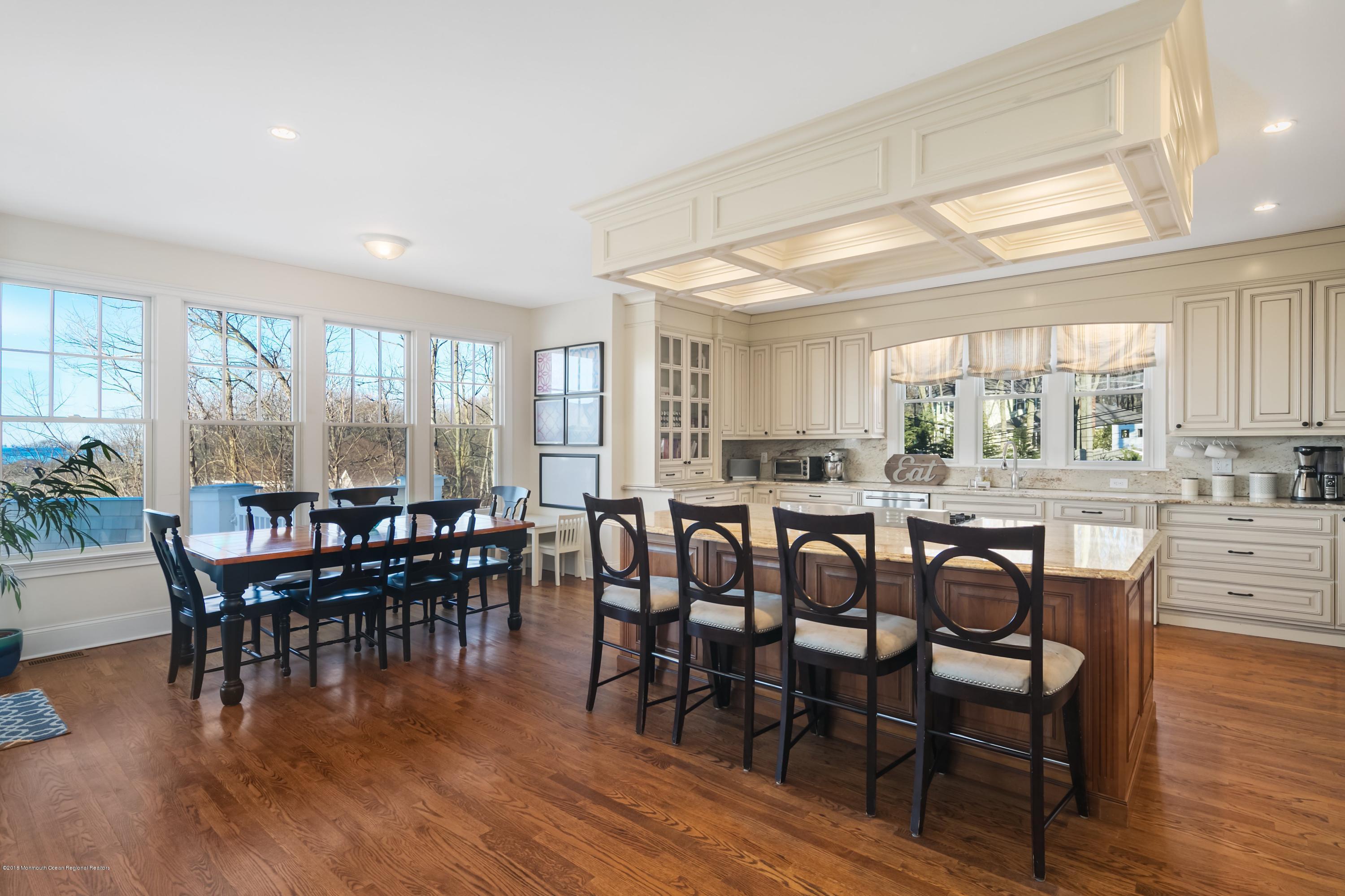207 Portland Road Middletown, NJ 07716 - Photo 11 of 37 a view of a dining room with furniture window and wooden floor