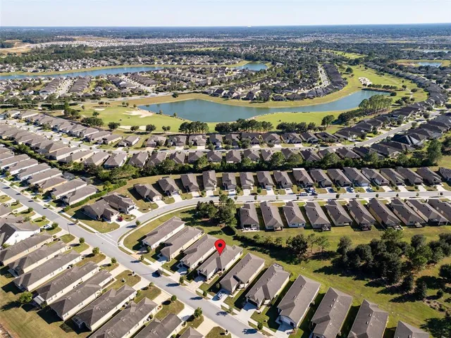 an aerial view of residential building with outdoor space