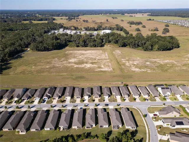 an aerial view of a house with a garden