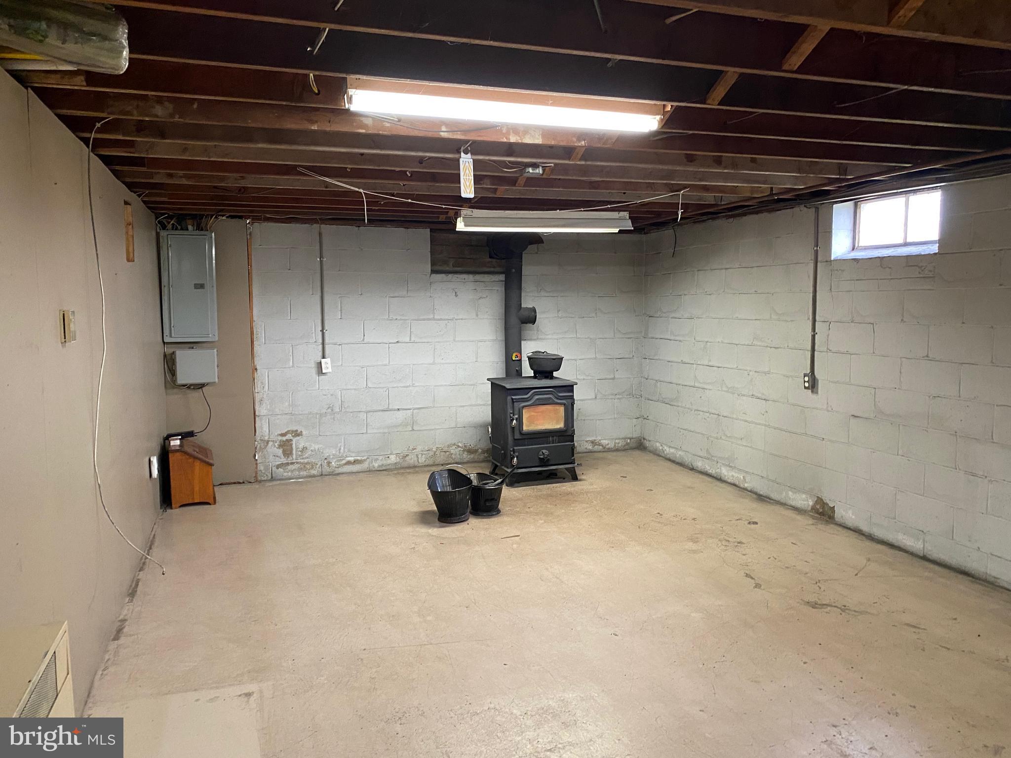 2180 Kumry Road Quakertown, PA 18951 - Photo 18 of 28 Basement w/ set up for Coal or Wood Stove