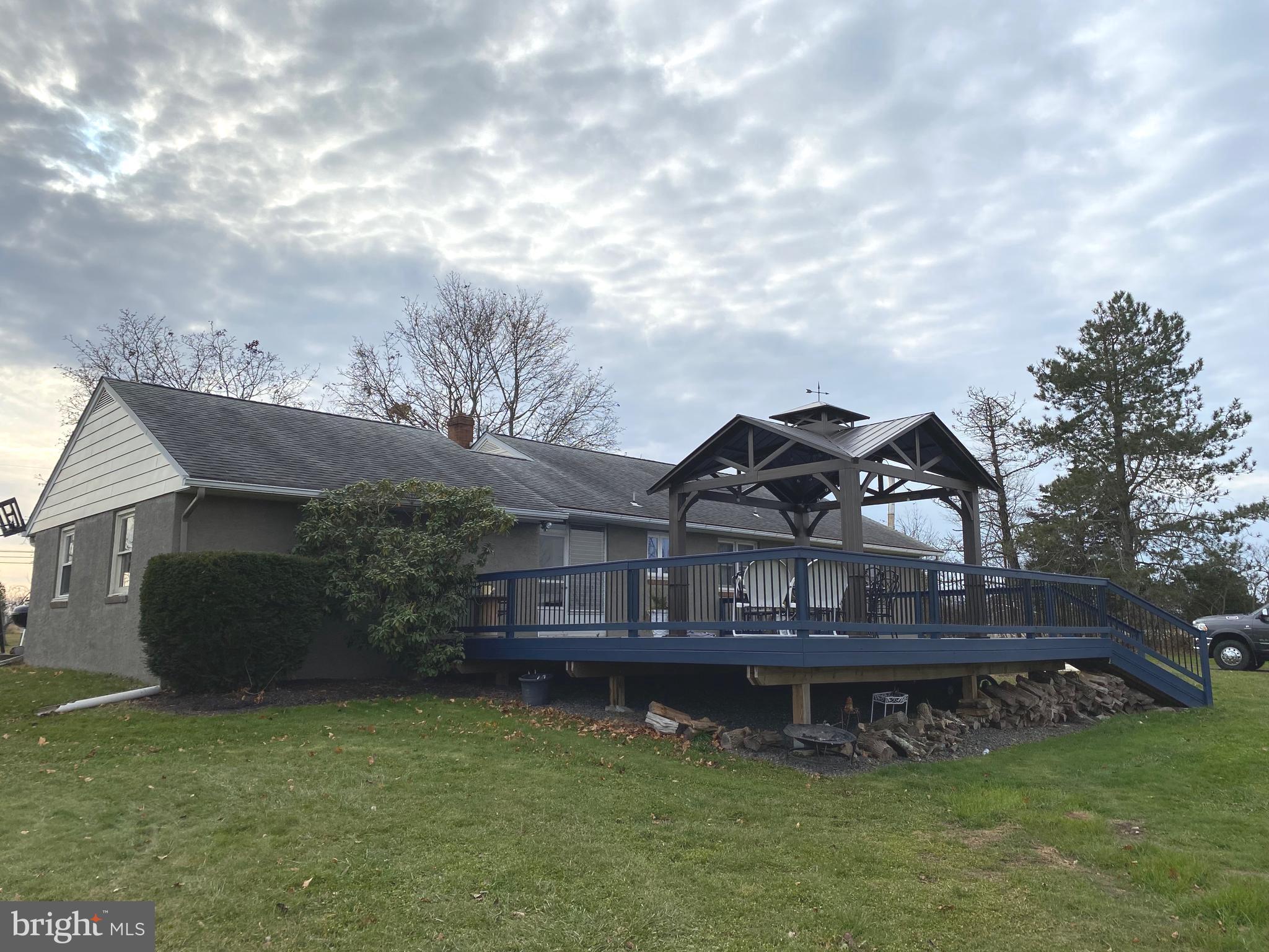 2180 Kumry Road Quakertown, PA 18951 - Photo 23 of 28 Rear View of Home and Deck