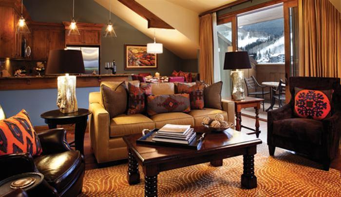 16 Vail Road, Unit 314A Vail, CO 81657 - Photo 3 of 5 a living room with furniture and a large window