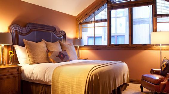 16 Vail Road, Unit 314A Vail, CO 81657 - Photo 5 of 5 a bedroom with a bed and a painting on the wall