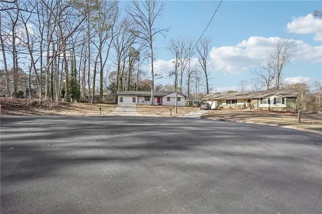 a view of a building with traffic signal