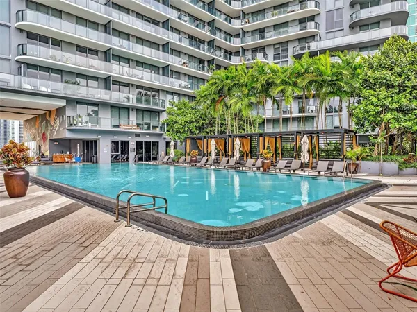 a view of building with swimming pool
