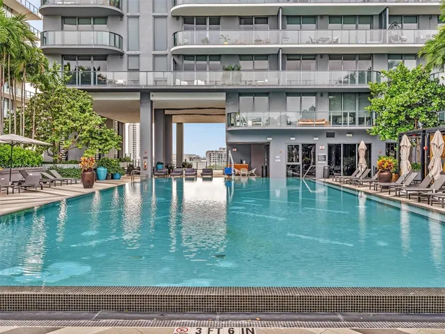 a view of pool with outdoor seating