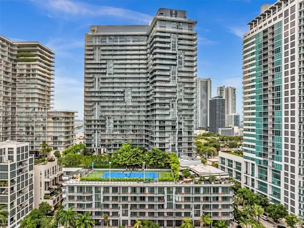a view of a city with tall buildings