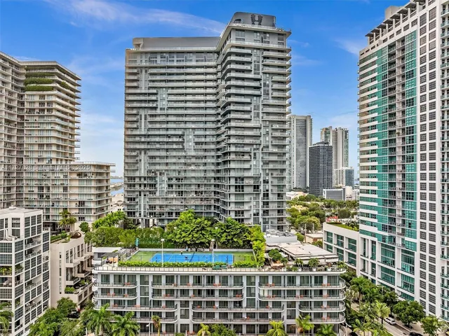 a view of a city with tall buildings