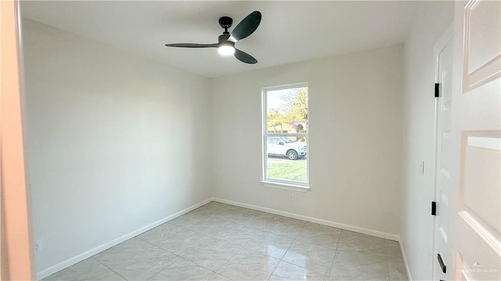 1509 Vida Dulce Weslaco, TX 78596 - Photo 19 of 24 an empty room with window and windows