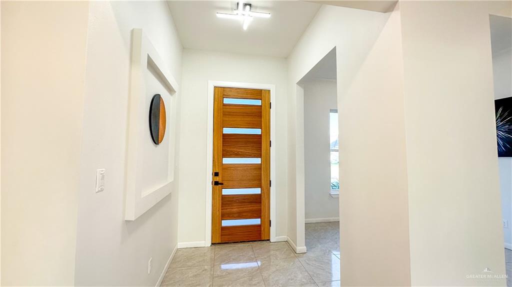 1509 Vida Dulce Weslaco, TX 78596 - Photo 2 of 24 a view of an entryway door