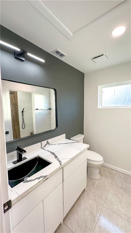 1509 Vida Dulce Weslaco, TX 78596 - Photo 21 of 24 a bathroom with a sink and a mirror